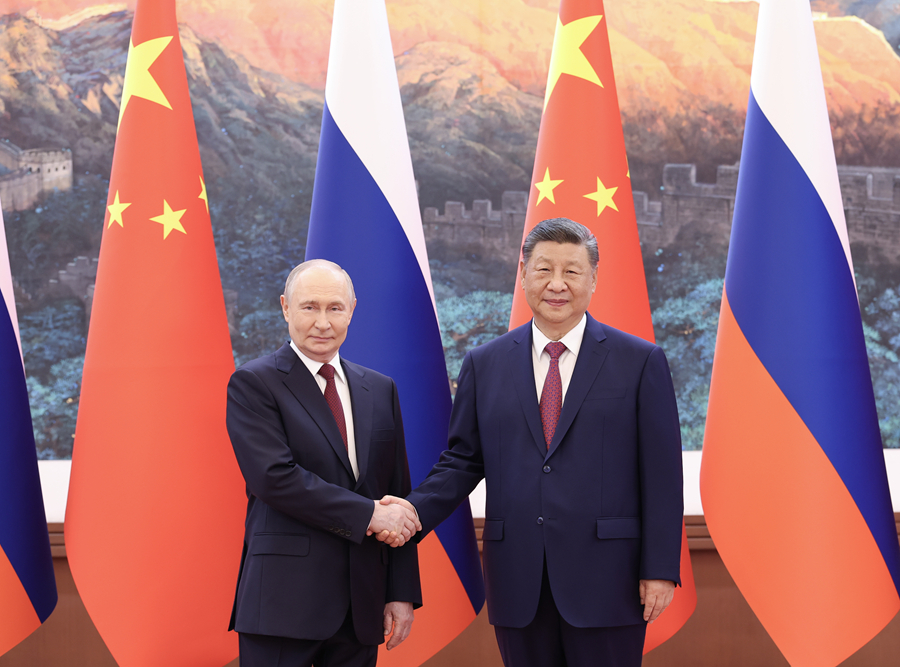 5月20日上午，国家主席习近平在北京人民大会堂同来华进行国事访问的俄罗斯总统普京举行会谈。.jpg
